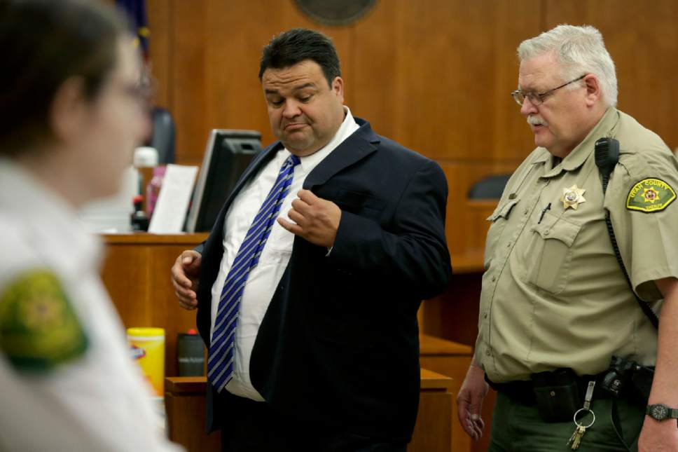 In this Thursday, March 30, 2017, photo, Keith Vallejo leaves the courtroom, in Provo, Utah. A Utah judge sentencing the former Mormon bishop said the convicted rapist was an "extraordinary, good man" who did something wrong. The Salt Lake Tribune reports that Judge Thomas Low appeared to become emotional on Wednesday, April 12, 2017, when he sentenced Vallejo to up to life in prison for 10 counts of forcible sexual abuse and one count of object rape. (Dominic Valente/Daily Herald via AP, Pool)