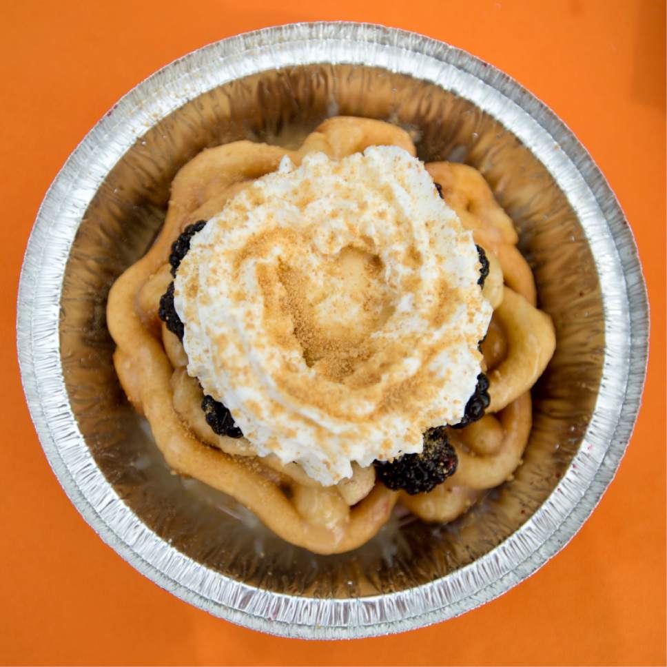 Rick Egan  |  The Salt Lake Tribune

The Black Berry funnel cake from The Other Side Food Truck. The Truck is a part of the Other Side Academy, a non-profit that helps disadvantaged adults get their lives back on track through hard work and discipline, Thursday, April 6, 2017.