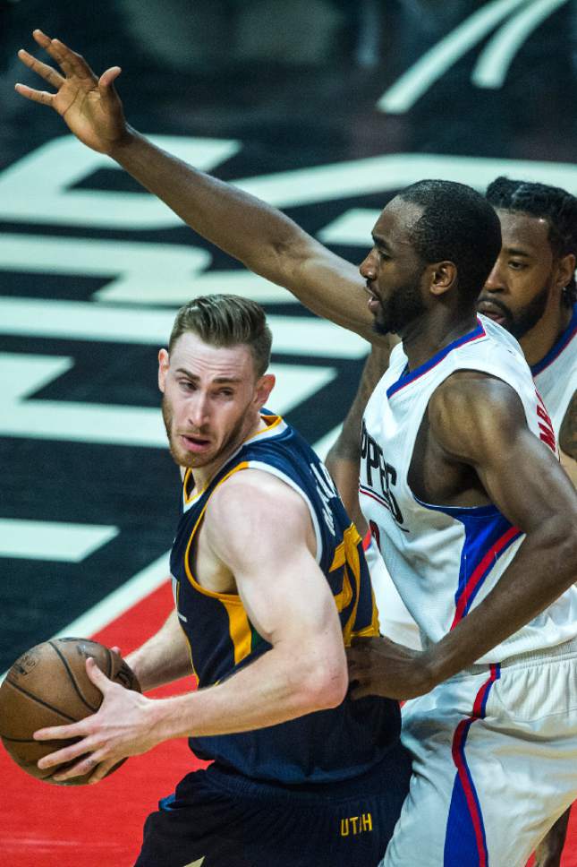 Chris Detrick  |  The Salt Lake Tribune
LA Clippers forward Luc Mbah a Moute (12) and LA Clippers center DeAndre Jordan (6) guard Utah Jazz forward Gordon Hayward (20) during Game 2 of the Western Conference at the Staples Center Tuesday, April 18, 2017.