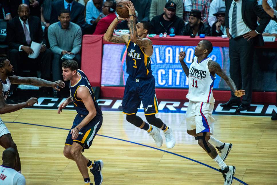 Chris Detrick  |  The Salt Lake Tribune
Utah Jazz guard George Hill (3) shoots past LA Clippers guard Jamal Crawford (11) during Game 2 of the Western Conference at the Staples Center Tuesday, April 18, 2017.