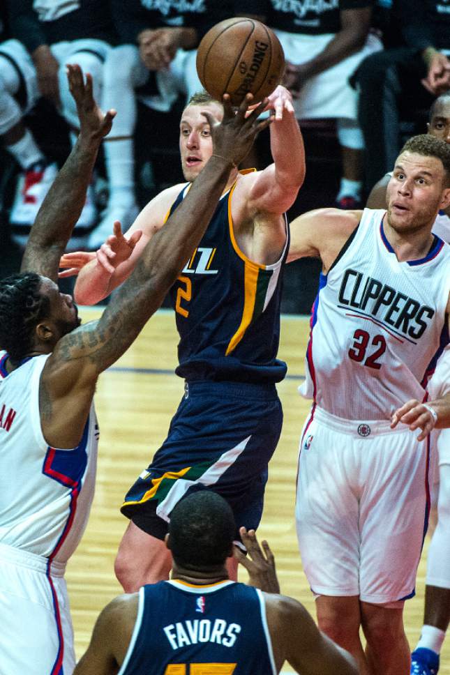 Chris Detrick  |  The Salt Lake Tribune
Utah Jazz forward Joe Ingles (2) passes around LA Clippers center DeAndre Jordan (6) and LA Clippers forward Blake Griffin (32) to Utah Jazz forward Derrick Favors (15) during Game 2 of the Western Conference at the Staples Center Tuesday, April 18, 2017.