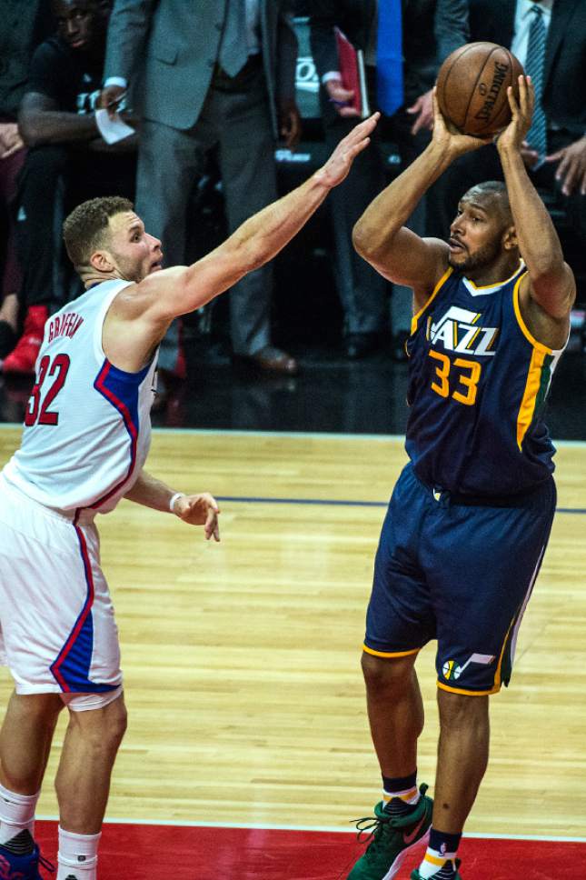 Chris Detrick  |  The Salt Lake Tribune
Utah Jazz center Boris Diaw (33) shoots past LA Clippers forward Blake Griffin (32) during Game 2 of the Western Conference at the Staples Center Tuesday, April 18, 2017.