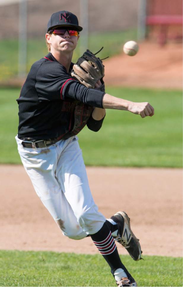 Rick Egan  |  The Salt Lake Tribune

Northridge third baseman Scott Daybell (26) fires the ball to first for an out, in prep baseball action, Fremont Vs. Northridge, in Layton. Wednesday, April 19, 2017.