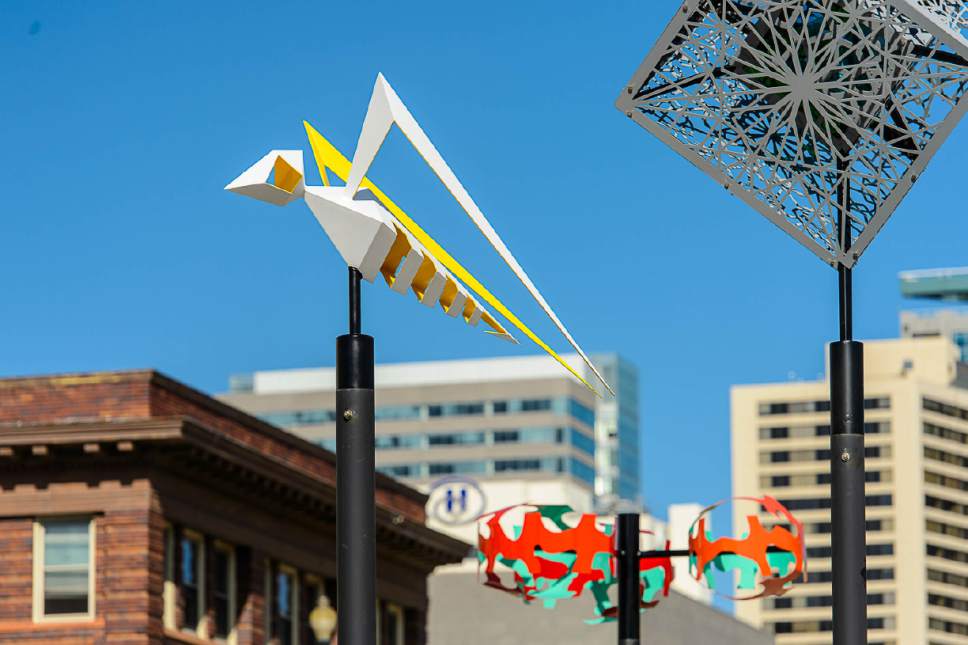 Trent Nelson  |  The Salt Lake Tribune
The Salt Lake City Public Art Program spent the day installing the permanent Flying Objects public art sculpture series along 300 South in downtown Salt Lake City, Saturday April 15, 2017.