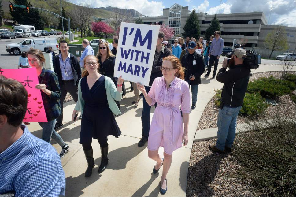 Scott Sommerdorf | The Salt Lake Tribune
Huntsman Cancer Institute faculty protest the firing of Institute CEO Mary Beckerle as they march from the HCI to President's Circle to deliver their petition to Vivian Lee's office, Wednesday, April 19, 2017.