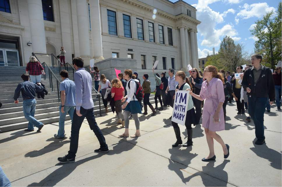 Scott Sommerdorf | The Salt Lake Tribune
Huntsman Cancer Institute faculty protest the firing of Institute CEO Mary Beckerle as they march from the HCI to President's Circle to deliver their petition to Vivian Lee's office, Wednesday, April 19, 2017.