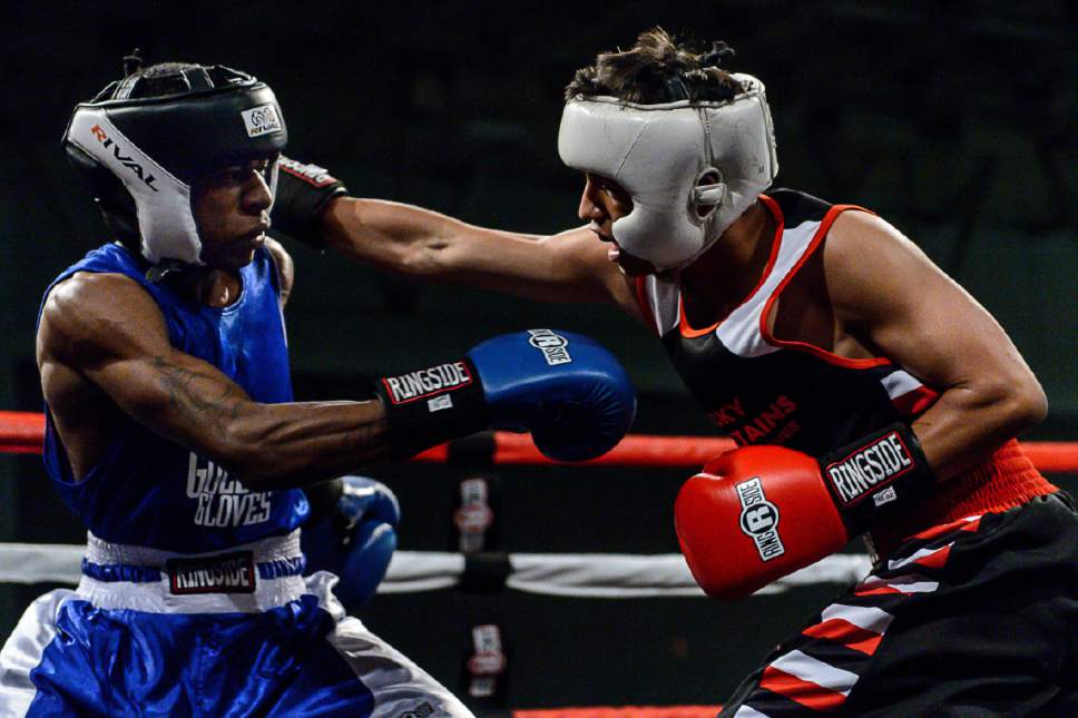 Trent Nelson  |  The Salt Lake Tribune
Diego Alvarez, Rocky Mountain (red), defeats Timothy Jarman, St. Louis, in boxing action at the Golden Gloves of America's 2016 National Tournament of Champions in Salt Lake City, Thursday May 19, 2016.