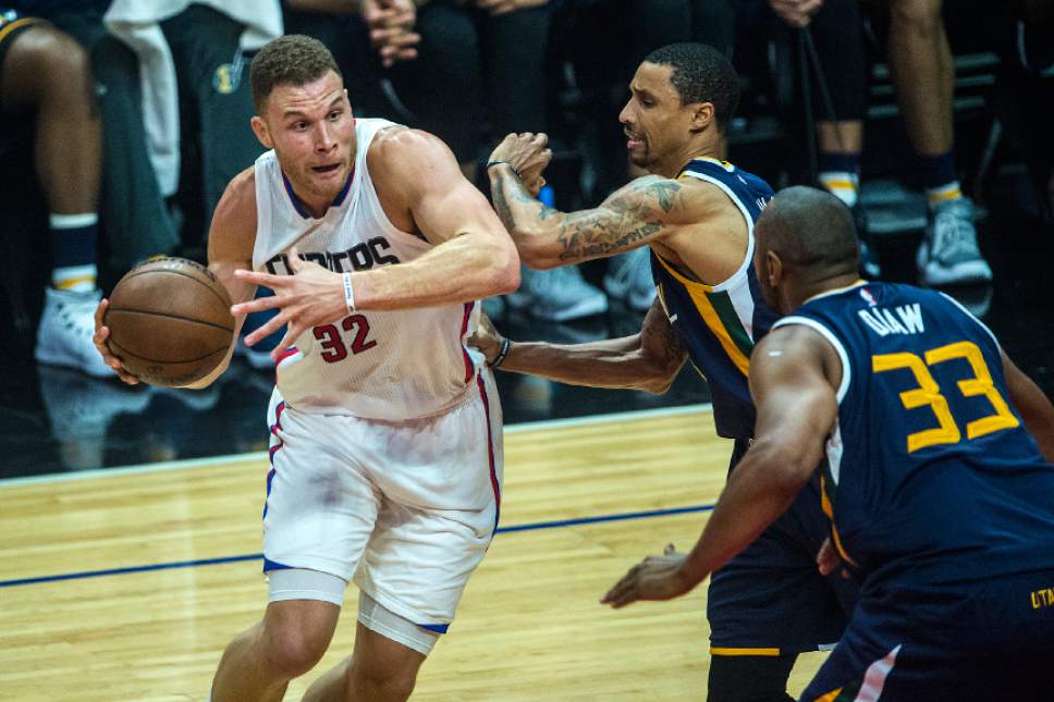 Chris Detrick  |  The Salt Lake Tribune
LA Clippers forward Blake Griffin (32) runs past Utah Jazz guard George Hill (3) and Utah Jazz center Boris Diaw (33) during Game 2 of the Western Conference at the Staples Center Tuesday, April 18, 2017.