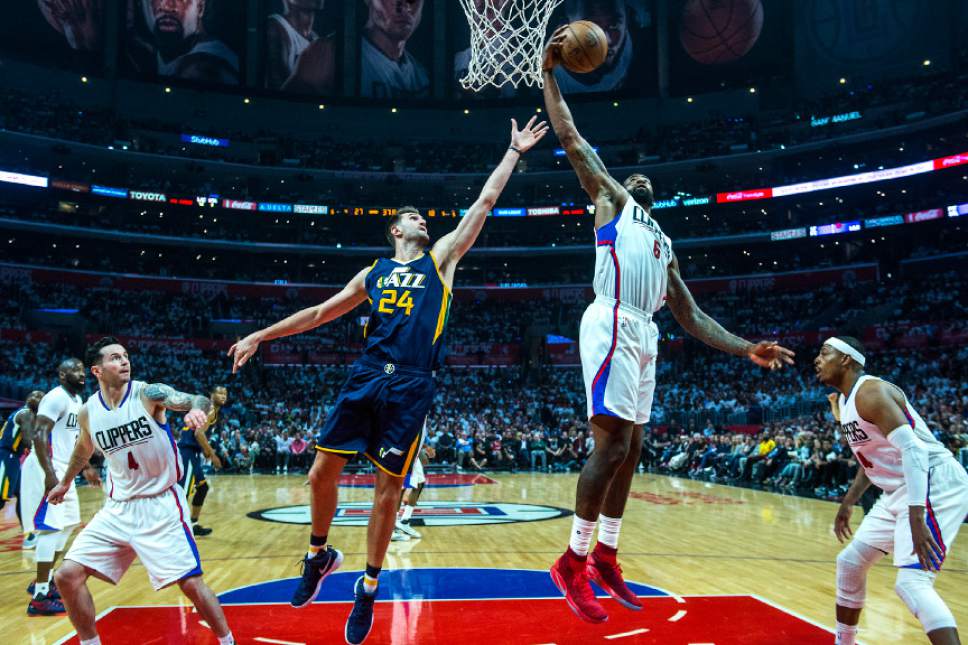 Chris Detrick  |  The Salt Lake Tribune
LA Clippers center DeAndre Jordan (6) grabs a rebound past Utah Jazz center Jeff Withey (24) during Game 2 of the Western Conference at the Staples Center Tuesday, April 18, 2017.