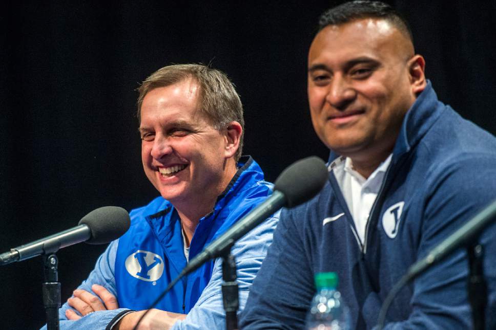 Chris Detrick  |  The Salt Lake Tribune
Offensive Coordinator Ty Detmer, left, and Head football coach Kalani Sitake laugh during a press conference at the BYU broadcasting building Wednesday February 1, 2017.