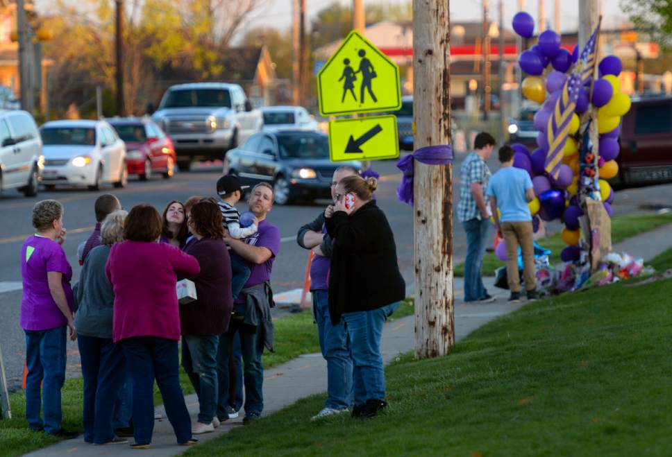 Steve Griffin  |  The Salt Lake Tribune


People gather at Syracuse Junior High School to attend a candlelight vigil for Dakota Kilburn who died from injuries he suffered after being hit by a car then pinned under another car in front of school in Syracuse Wednesday April 19, 2017.