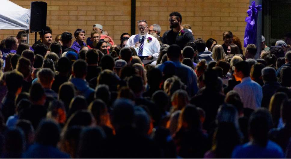 Steve Griffin  |  The Salt Lake Tribune


Hundreds of people listen to speakers as they attend a candlelight vigil for Dakota Kilburn who died from injuries he suffered after being hit by a car then pinned under another car in front of Syracuse Junior High School in Syracuse Wednesday April 19, 2017. The vigil was held at the Syracuse junior high school.