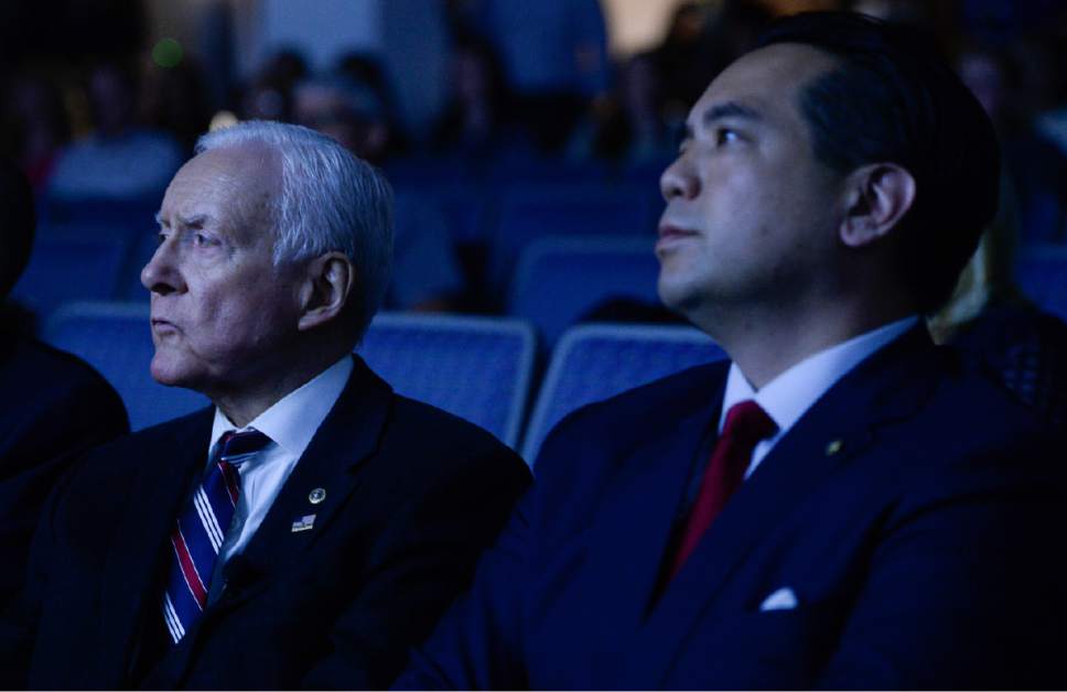 Francisco Kjolseth | The Salt Lake Tribune
Utah Senator Orrin Hatch, left, is joined by Utah Attorney General Sean Reyes, as they watch footage of a recent sting operation on child sex trafficking during an event at Younique, a cosmetic company in Lehi who's foundation provides services for women who are survivors of sexual abuse.