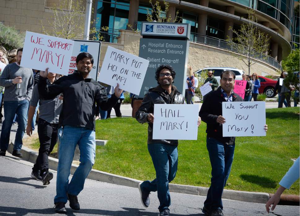 Scott Sommerdorf | The Salt Lake Tribune
Huntsman Cancer Institute faculty protest the firing of Institute CEO Mary Beckerle as they march to University of Utah President David Pershing's office, Wednesday, April 19, 2017.