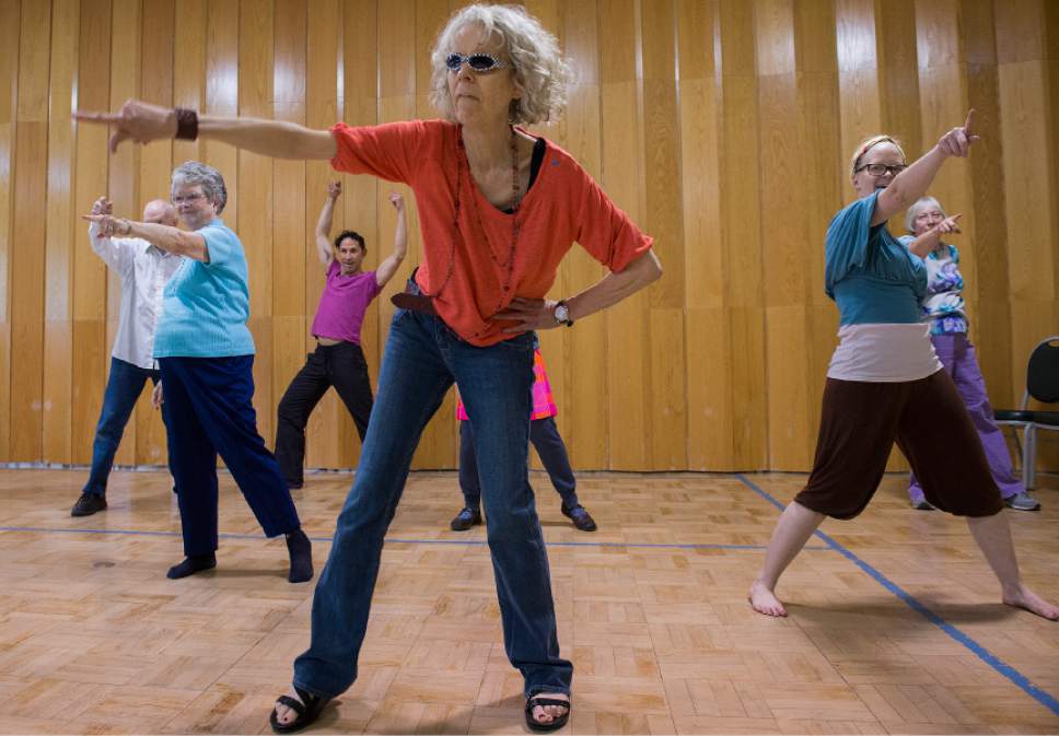 Leah Hogsten  |  The Salt Lake Tribune 
Janice Bosworth  performs during a dress rehearsal Thursday, April 20, 2017, at the 10th East Senior Center for a Saturday, April 22 dance performance, "That 70's Show" by Grey Matters Dance for Parkinson's - Utah. The Grey Matters program is a way for participants to use dance and creativity to alleviate the physical, social, emotional and cognitive symptoms of the disease.