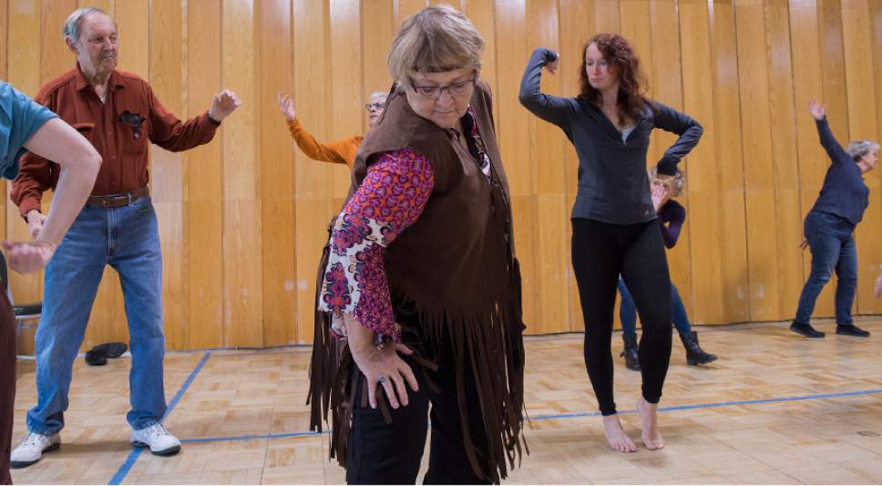 Leah Hogsten  |  The Salt Lake Tribune 
Patti Allen performs during a dress rehearsal Thursday, April 20, 2017, at the 10th East Senior Center for a Saturday, April 22 dance performance, "That 70's Show" by Grey Matters Dance for Parkinson's - Utah. The Grey Matters program is a way for participants to use dance and creativity to alleviate the physical, social, emotional and cognitive symptoms of the disease.
