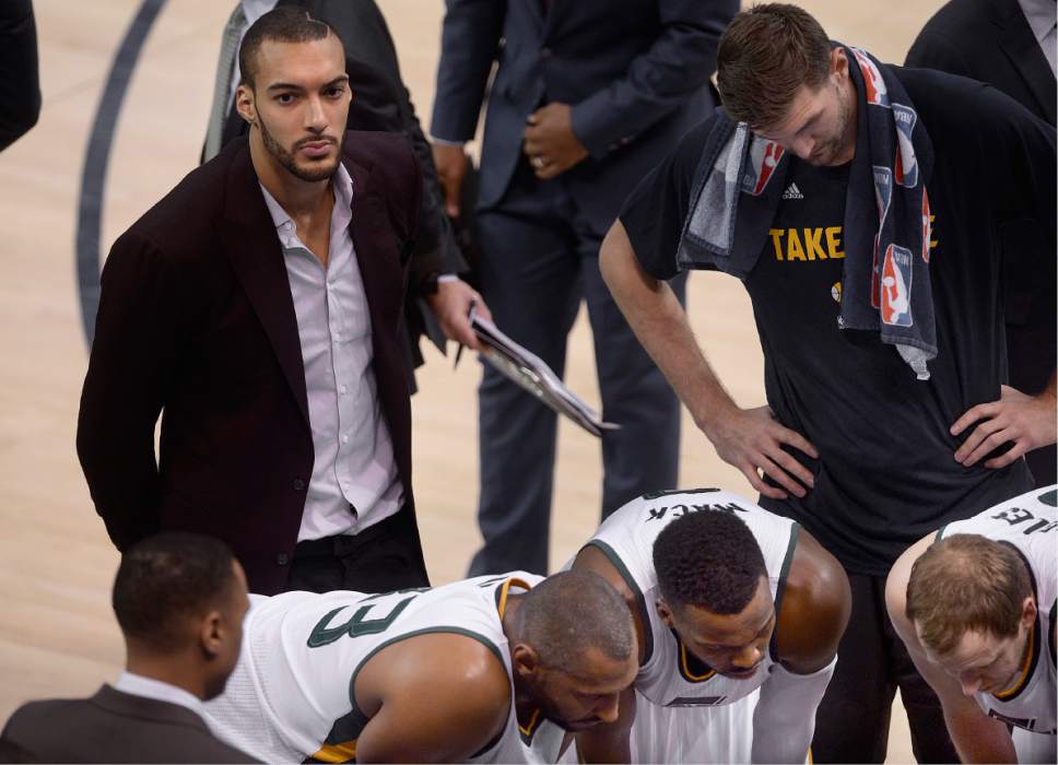 Scott Sommerdorf | The Salt Lake Tribune
Injured Utah Jazz center Rudy Gobert (27) sits on the edges of a Jazz time out during first half play. Utah took a 58-49 lead at the half of Game 3 of the Western Conference playoff series, Friday, April 21, 2017.
