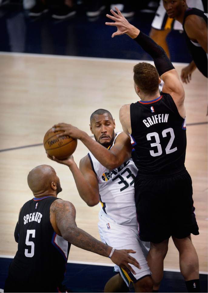 Scott Sommerdorf | The Salt Lake Tribune
Utah Jazz center Boris Diaw (33) gets sandwiched between LA Clippers center Marreese Speights (5) and  LA Clippers forward Blake Griffin (32) during first half play. Utah took a 58-49 lead at the half of Game 3 of the Western Conference playoff series, Friday, April 21, 2017.
