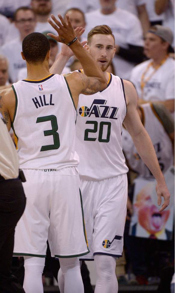 Leah Hogsten  |  The Salt Lake Tribune 
Utah Jazz forward Gordon Hayward (20) celebrates his dunk with Utah Jazz guard George Hill (3). The Utah Jazz lead the Los Angeles Clippers after the third quarter during Game 3 of their first-round Western Conference playoff series at Vivint Smart Home Arena, Friday, April 21, 2017.