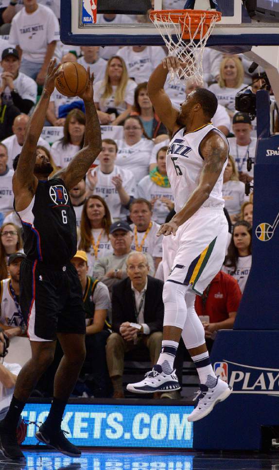 Leah Hogsten  |  The Salt Lake Tribune 
Utah Jazz forward Derrick Favors (15) denies LA Clippers center DeAndre Jordan (6). The Utah Jazz lead the Los Angeles Clippers after the first quarter during Game 3 of their first-round Western Conference playoff series at Vivint Smart Home Arena, Friday, April 21, 2017.