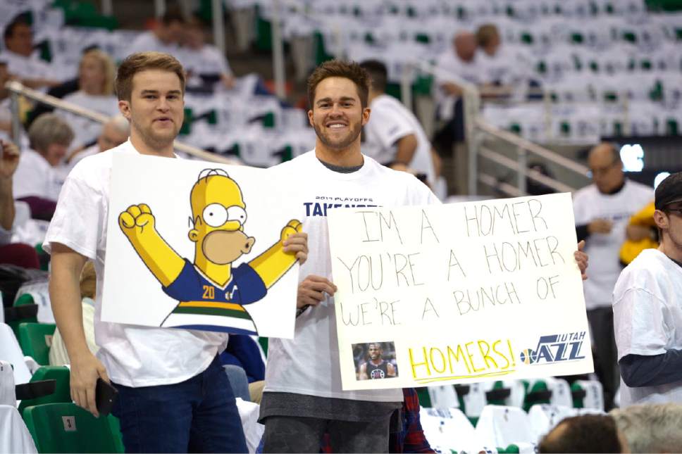 Leah Hogsten  |  The Salt Lake Tribune 
The arena is filled with fans holding signs celebrating Homer Simpson signs as a result of Clippers player Chris Paul calling Jazz fans "homers" earlier in the week.  The Utah Jazz host the Los Angeles Clippers during Game 3 of their first-round Western Conference playoff series at Vivint Smart Home Arena, Friday, April 21, 2017.