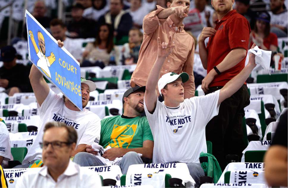 Scott Sommerdorf | The Salt Lake Tribune
Jazz fans get the attention of some Clippers fans prior to Game 3 of the Western Conference playoff series, Friday, April 21, 2017.