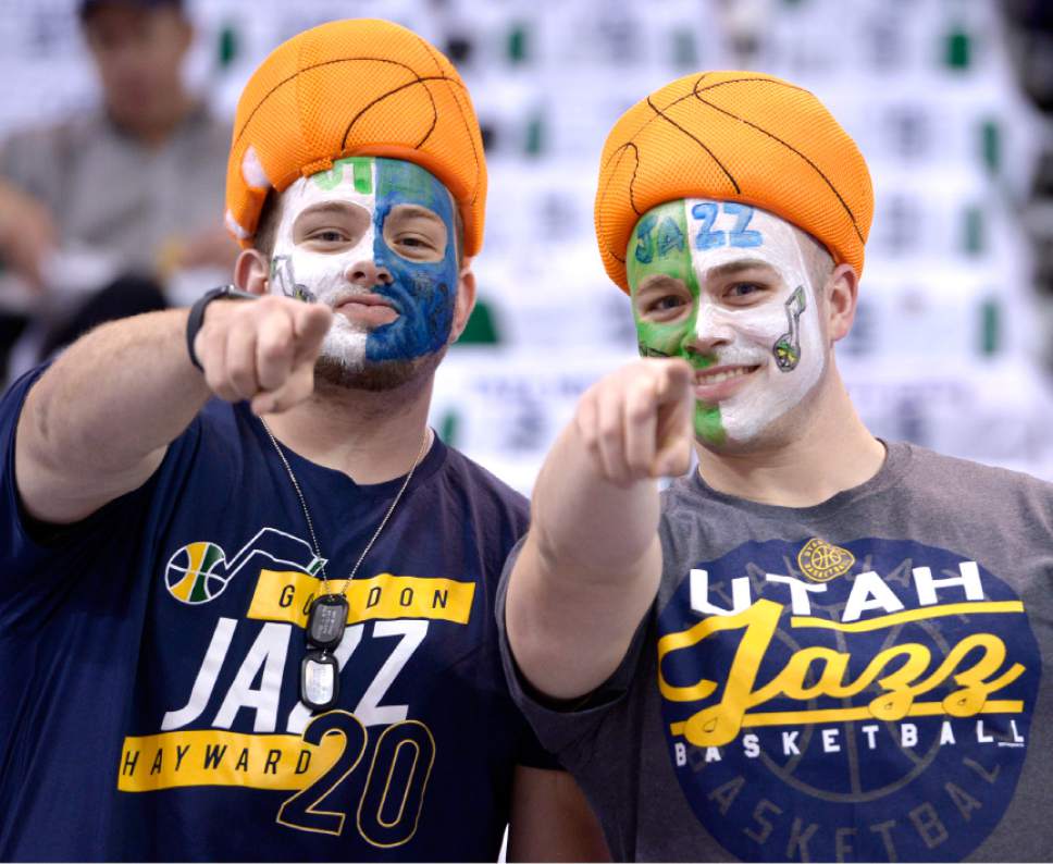 Leah Hogsten  |  The Salt Lake Tribune 
l-r Brothers Justen Nuffer and David Nuffer get ready to celebrate David's birthday as "superfan" style as the Utah Jazz host the Los Angeles Clippers during Game 3 of their first-round Western Conference playoff series at Vivint Smart Home Arena, Friday, April 21, 2017.