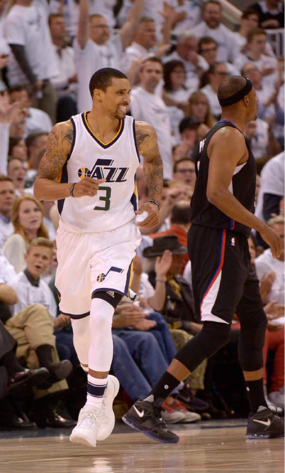 Leah Hogsten  |  The Salt Lake Tribune 
Utah Jazz guard George Hill (3) celebrates a 3-point sink. The Utah Jazz lead the Los Angeles Clippers after the third quarter during Game 3 of their first-round Western Conference playoff series at Vivint Smart Home Arena, Friday, April 21, 2017.