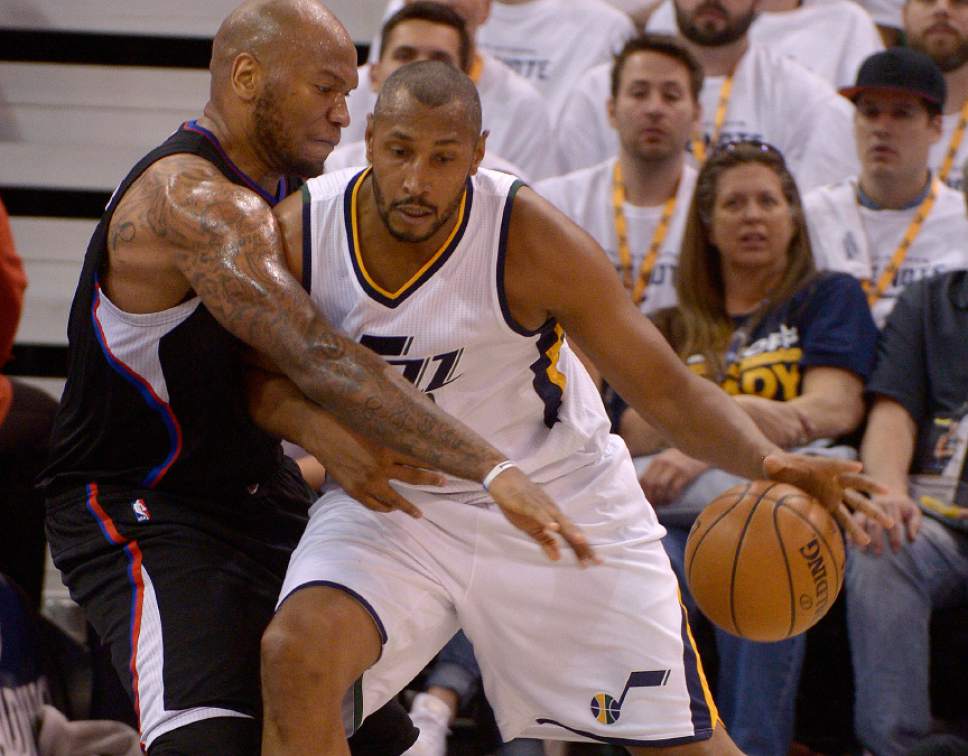 Leah Hogsten  |  The Salt Lake Tribune 
LA Clippers center Marreese Speights (5) pressures Utah Jazz center Boris Diaw (33). The Utah Jazz lead the Los Angeles Clippers after the third quarter during Game 3 of their first-round Western Conference playoff series at Vivint Smart Home Arena, Friday, April 21, 2017.