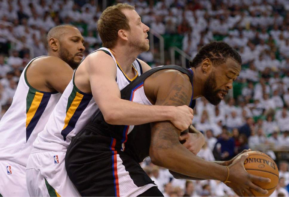 Leah Hogsten  |  The Salt Lake Tribune 
Utah Jazz forward Joe Ingles (2) fouls LA Clippers center DeAndre Jordan (6). The Utah Jazz lead the Los Angeles Clippers after the third quarter during Game 3 of their first-round Western Conference playoff series at Vivint Smart Home Arena, Friday, April 21, 2017.