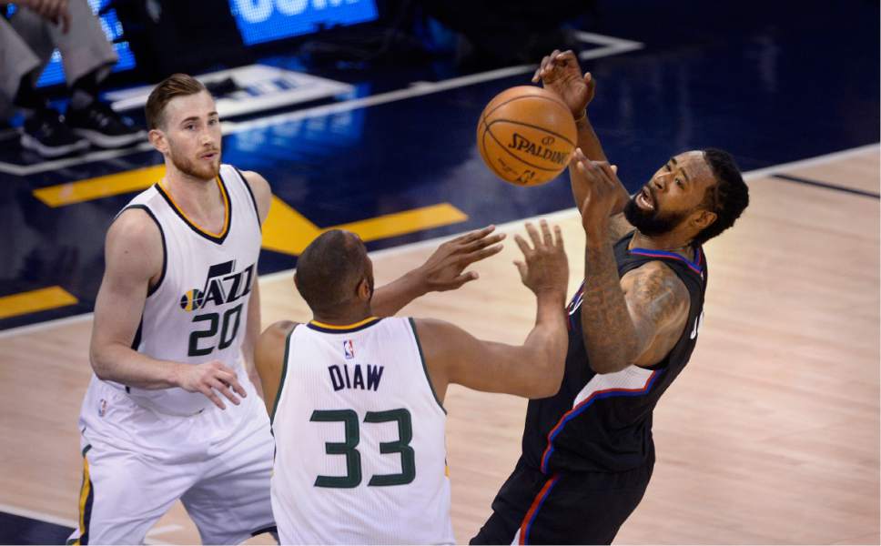 Scott Sommerdorf | The Salt Lake Tribune
Utah Jazz forward Gordon Hayward (20), Utah Jazz center Boris Diaw (33) and LA Clippers center DeAndre Jordan (6) battle for a loose ball during first half play. Utah took a 58-49 lead at the half of Game 3 of the Western Conference playoff series, Friday, April 21, 2017.