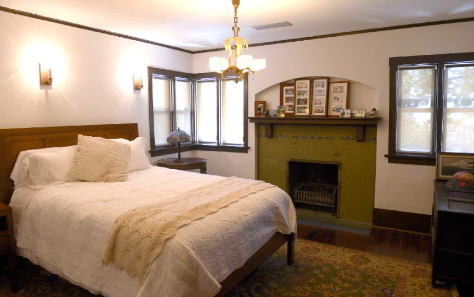 Leah Hogsten  |  The Salt Lake Tribune 
The original chandelier, sconces, fireplace and windows in the guest bedroom. The B.B. Grey House, built in 1912, at 1430 E. Yale Ave., is one of seven in the Yalecrest neighborhood that will be featured Saturday, April 22, during Preservation Utah's 46th Annual Historic Home Tour.