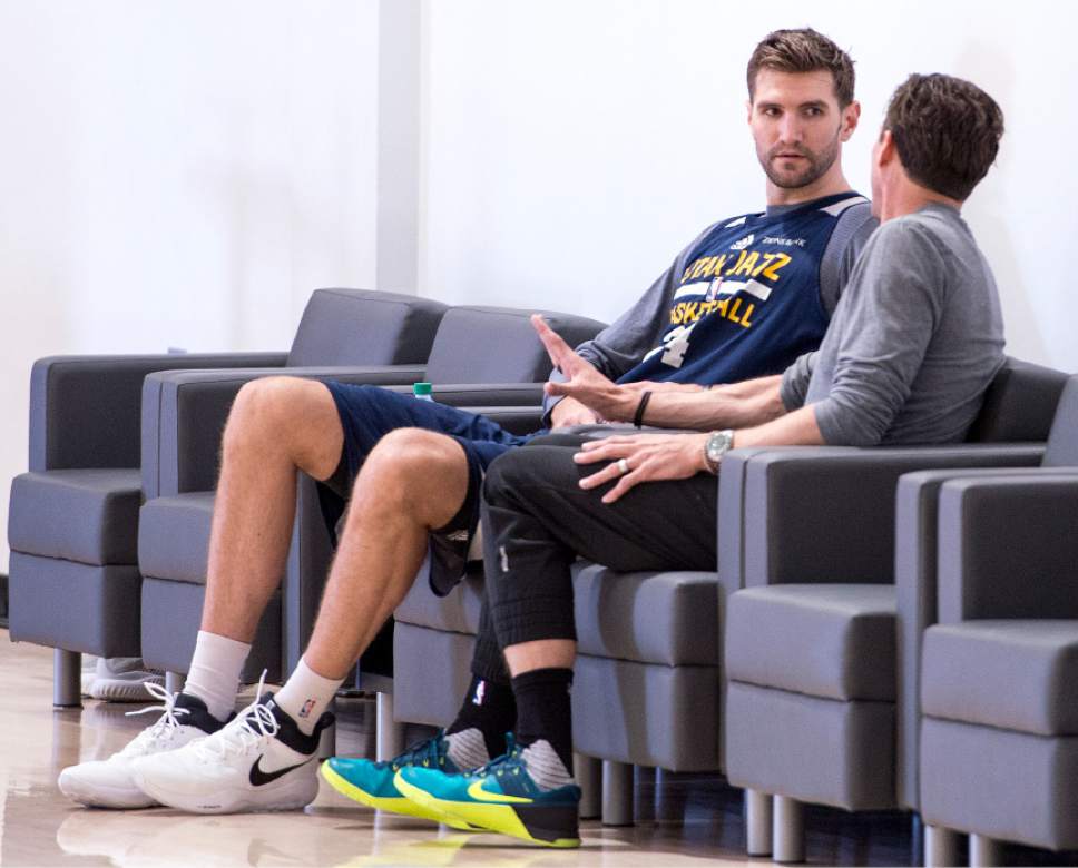 Leah Hogsten  |  The Salt Lake Tribune 
Utah Jazz play Jeff Withey talks with Utah Jazz head coach Quin Snyder during the Utah Jazz practice Saturday, April 22, 2017 at the Zions Jazz Practice facility.