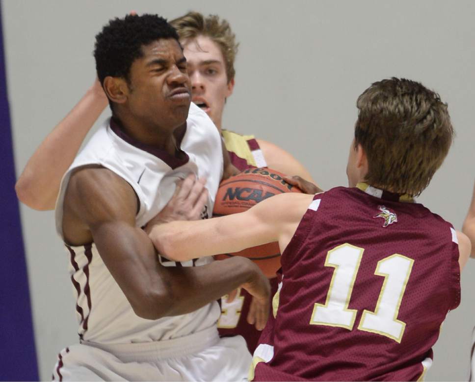 Steve Griffin  |  The Salt Lake Tribune

Lone Peak's Christian Popoola (51) battles for the ball with Viewmont's Braedon Alldredge (11) during quarterfinals of the boy's 5A basketball state tournament game at the Dee Event Center in Ogden, Wednesday, February 25, 2015.