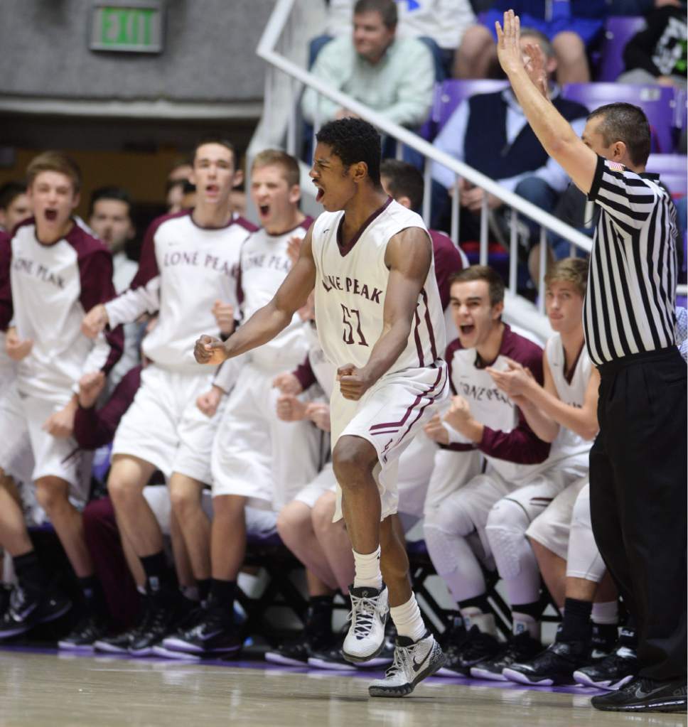 Steve Griffin  |  The Salt Lake Tribune

Lone Peak's Christian Popoola (51)pumps his fists after nailing a three pointer late in the game during quarterfinals of the boy's 5A basketball state tournament game against Viewmont at the Dee Event Center in Ogden, Wednesday, February 25, 2015.