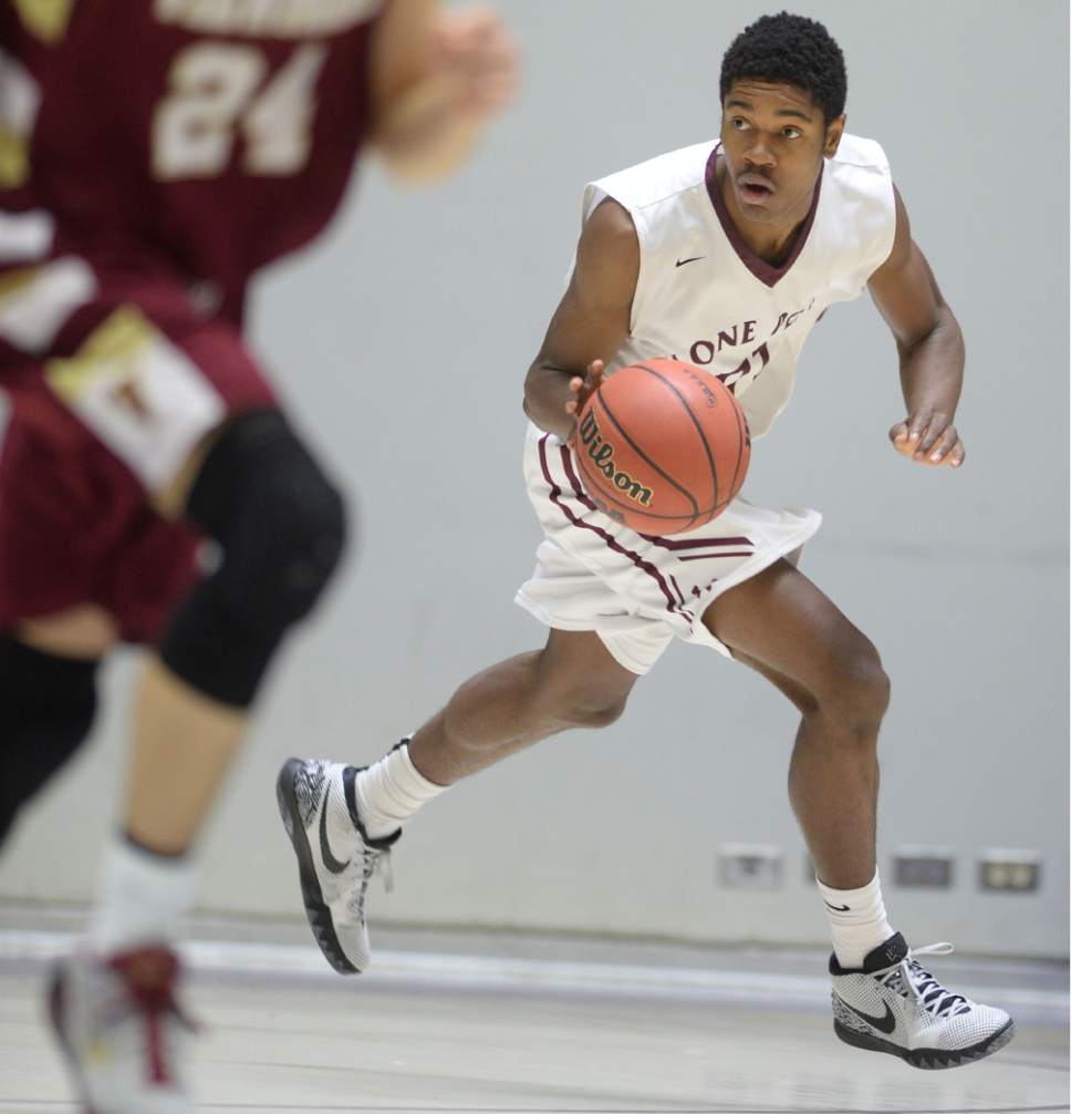 Steve Griffin  |  The Salt Lake Tribune

Lone Peak's Christian Popoola (51) races up court during quarterfinals of the boy's 5A basketball state tournament game against Viewmont at the Dee Event Center in Ogden, Wednesday, February 25, 2015.