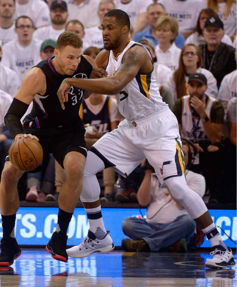 Leah Hogsten  |  The Salt Lake Tribune 
Utah Jazz forward Derrick Favors (15) battles LA Clippers forward Blake Griffin (32) under the net. The Utah Jazz lead the Los Angeles Clippers after the first quarter during Game 3 of their first-round Western Conference playoff series at Vivint Smart Home Arena, Friday, April 21, 2017.