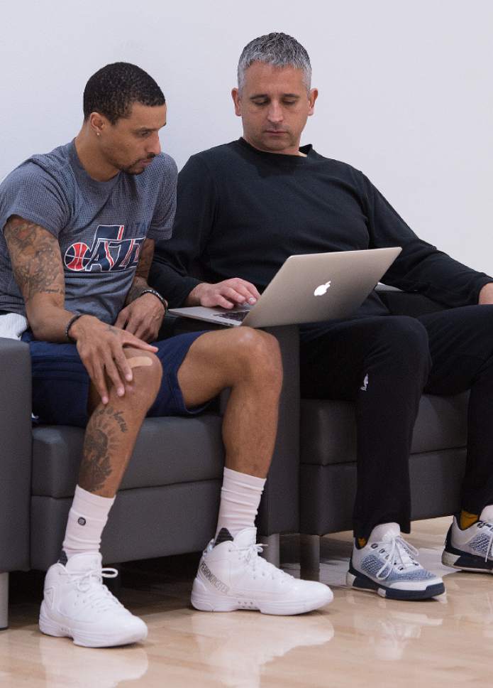 Leah Hogsten  |  The Salt Lake Tribune 
Utah Jazz guard George Hill consults with Jazz assistant coach Igor Kokoskov during the Utah Jazz practice Saturday, April 22, 2017 at the Zions Jazz Practice facility.