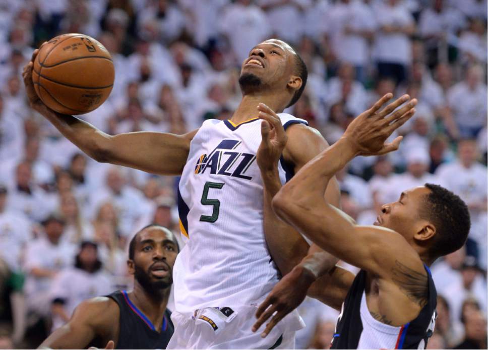 Steve Griffin  |  The Salt Lake Tribune


Utah Jazz guard Rodney Hood (5) gets to the basket during the Jazz versus Clippers NBA playoff game at Viviint Smart Home arena in Salt Lake City Sunday April 23, 2017.