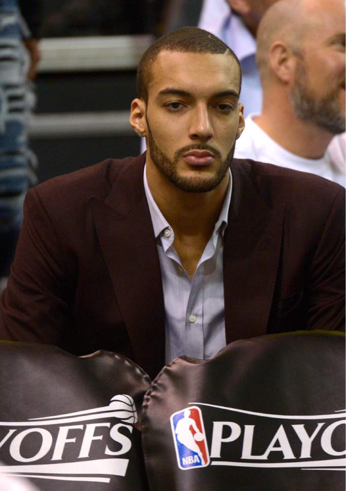 Leah Hogsten  |  The Salt Lake Tribune 
Utah Jazz center Rudy Gobert (27) watched the game from the sidelines. The Utah Jazz lead the Los Angeles Clippers after the third quarter during Game 3 of their first-round Western Conference playoff series at Vivint Smart Home Arena, Friday, April 21, 2017.