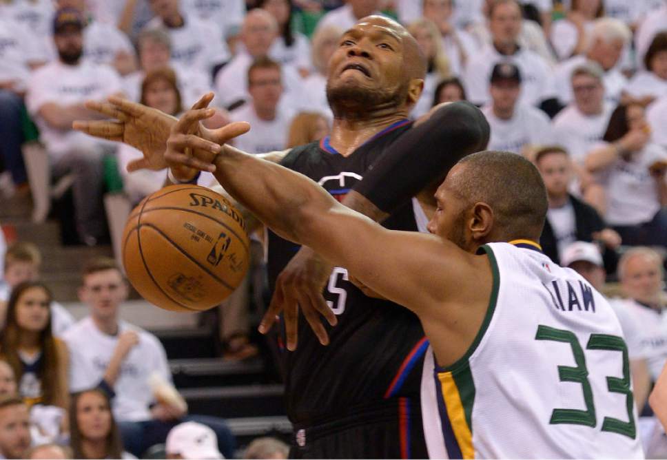 Leah Hogsten  |  The Salt Lake Tribune 
Utah Jazz center Boris Diaw (33) denies LA Clippers center Marreese Speights (5). The Utah Jazz lead the Los Angeles Clippers after the third quarter during Game 3 of their first-round Western Conference playoff series at Vivint Smart Home Arena, Friday, April 21, 2017.