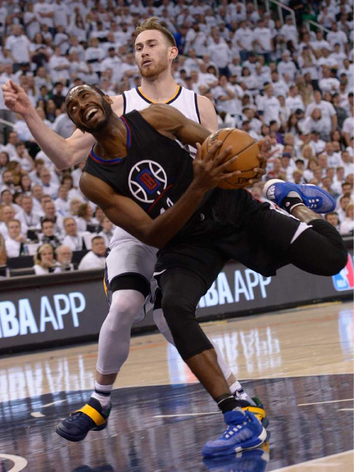 Leah Hogsten  |  The Salt Lake Tribune 
LA Clippers forward Luc Mbah a Moute (12) drives to the net around Utah Jazz forward Gordon Hayward (20) who was given a foul. The Utah Jazz lead the Los Angeles Clippers after the third quarter during Game 3 of their first-round Western Conference playoff series at Vivint Smart Home Arena, Friday, April 21, 2017.