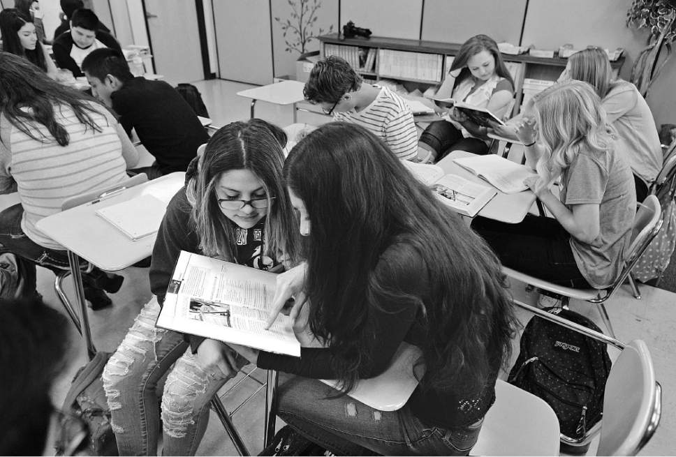 Steve Griffin  |  Salt Lake Tribune file photo


Maribel Flores and Galilea Castaneda read a passage from their text book as they attend Indgrid Campos' AP Spanish class at Layton High School, in Layton, Utah Thursday, April 7, 2016. The first cohort of students who enrolled in Utah's dual immersion programs are now reaching the age where they can take high school AP language courses for college credit.