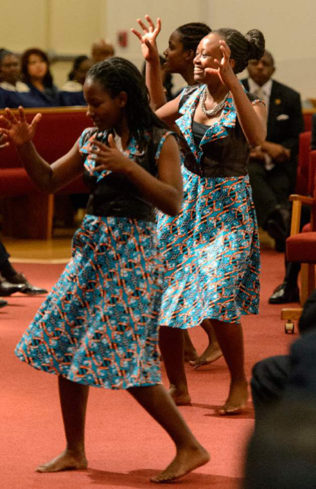 Steve Griffin  |  The Salt Lake Tribune


Children dance as The Rev. France A. Davis of Calvary Baptist Church celebrates his 43rd anniversary during a special Anniversary Service at the Salt Lake City church Sunday April 23, 2017.Davis arrived in Salt Lake City in 1974 and has had uninterrupted service as the pastor of Calvary Baptist Church since his appointment.  Calvary congregation serves more than 700 members.
