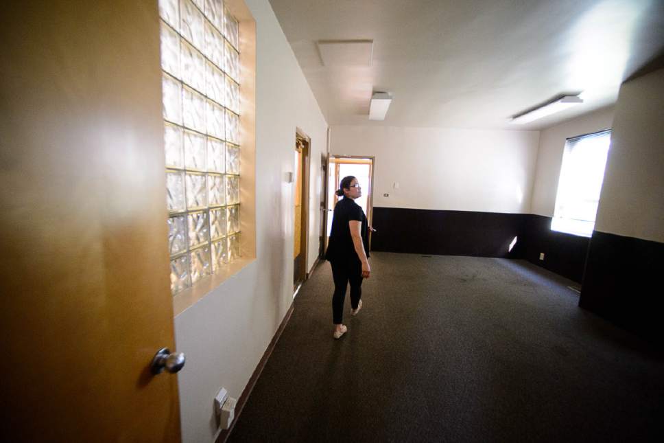 Trent Nelson  |  The Salt Lake Tribune
Raquel Da Silva shows an Ogden fire station that will be converted into a day center for homeless individuals by the organization Family Promise of Ogden, Wednesday April 12, 2017.