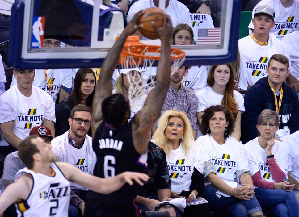 Scott Sommerdorf | The Salt Lake Tribune
Fans react as LA Clippers center DeAndre Jordan (6) is about to score on a dunk during first quarter play. The Utah Jazz trailed the LA Clipper 26-24 at the end of the first period of Game 4 of the Western Conference playoffs, Sunday, April 23, 2017.