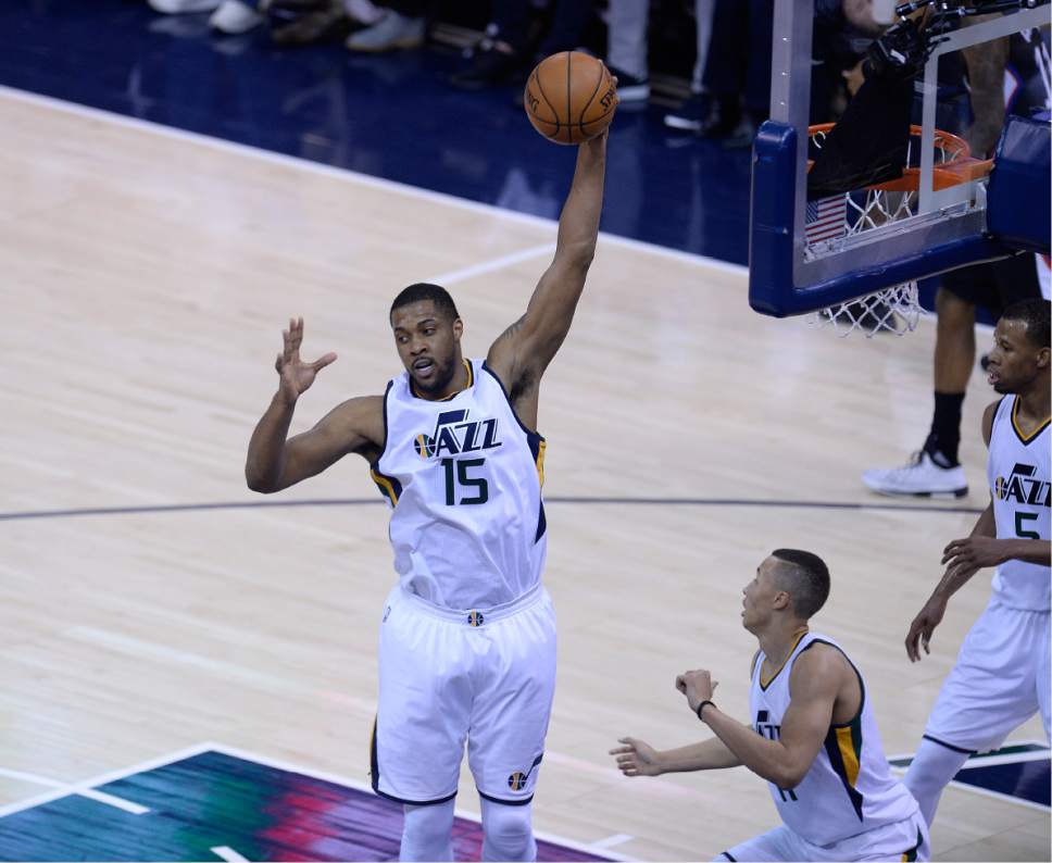 Scott Sommerdorf | The Salt Lake Tribune
Utah Jazz forward Derrick Favors (15) rips down a rebound during second half play. The Utah Jazz beat the LA Clipper 105-98 to take Game 4 and tie up the Western Conference playoff series at 2-2, Sunday, April 23, 2017.