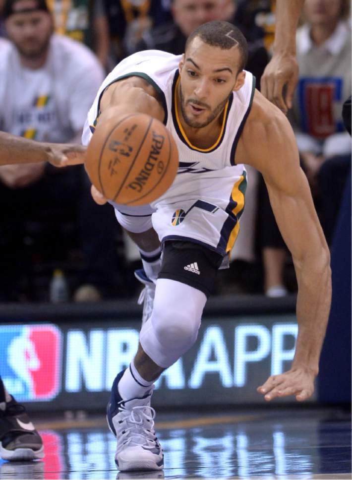 Steve Griffin  |  The Salt Lake Tribune


Utah Jazz center Rudy Gobert (27) dives for the ball during the Jazz versus Clippers NBA playoff game at Viviint Smart Home arena in Salt Lake City Sunday April 23, 2017.