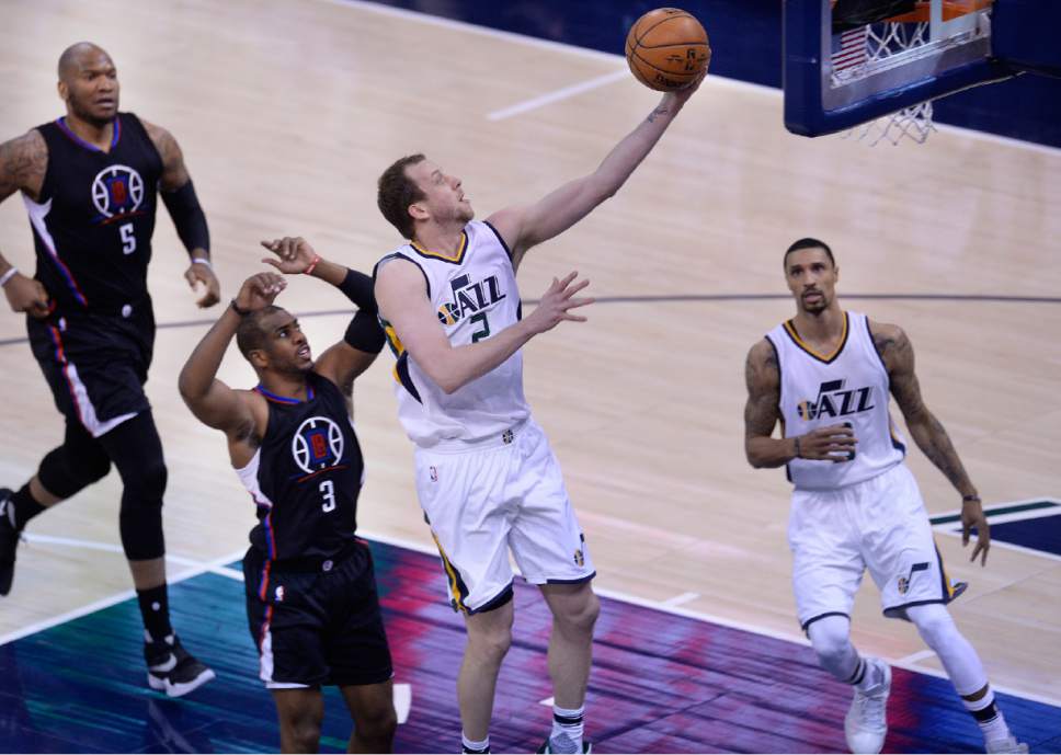 Scott Sommerdorf | The Salt Lake Tribune
Utah Jazz forward Joe Ingles (2) gets an easy layup past the defense of LA Clippers guard Chris Paul (3) during first quarter play. The Utah Jazz trailed the LA Clipper 26-24 at the end of the first period of Game 4 of the Western Conference playoffs, Sunday, April 23, 2017.