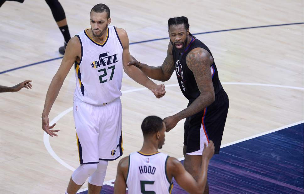 Scott Sommerdorf | The Salt Lake Tribune
LA Clippers center DeAndre Jordan (6) yells in the direction of Utah Jazz guard Rodney Hood (5) while guarding Utah Jazz center Rudy Gobert (27) during first quarter play. The Utah Jazz trailed the LA Clipper 26-24 at the end of the first period of Game 4 of the Western Conference playoffs, Sunday, April 23, 2017.